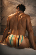 Men’s slimmer bulge briefs in retro striped teal orange and cream with subtle textured fabric