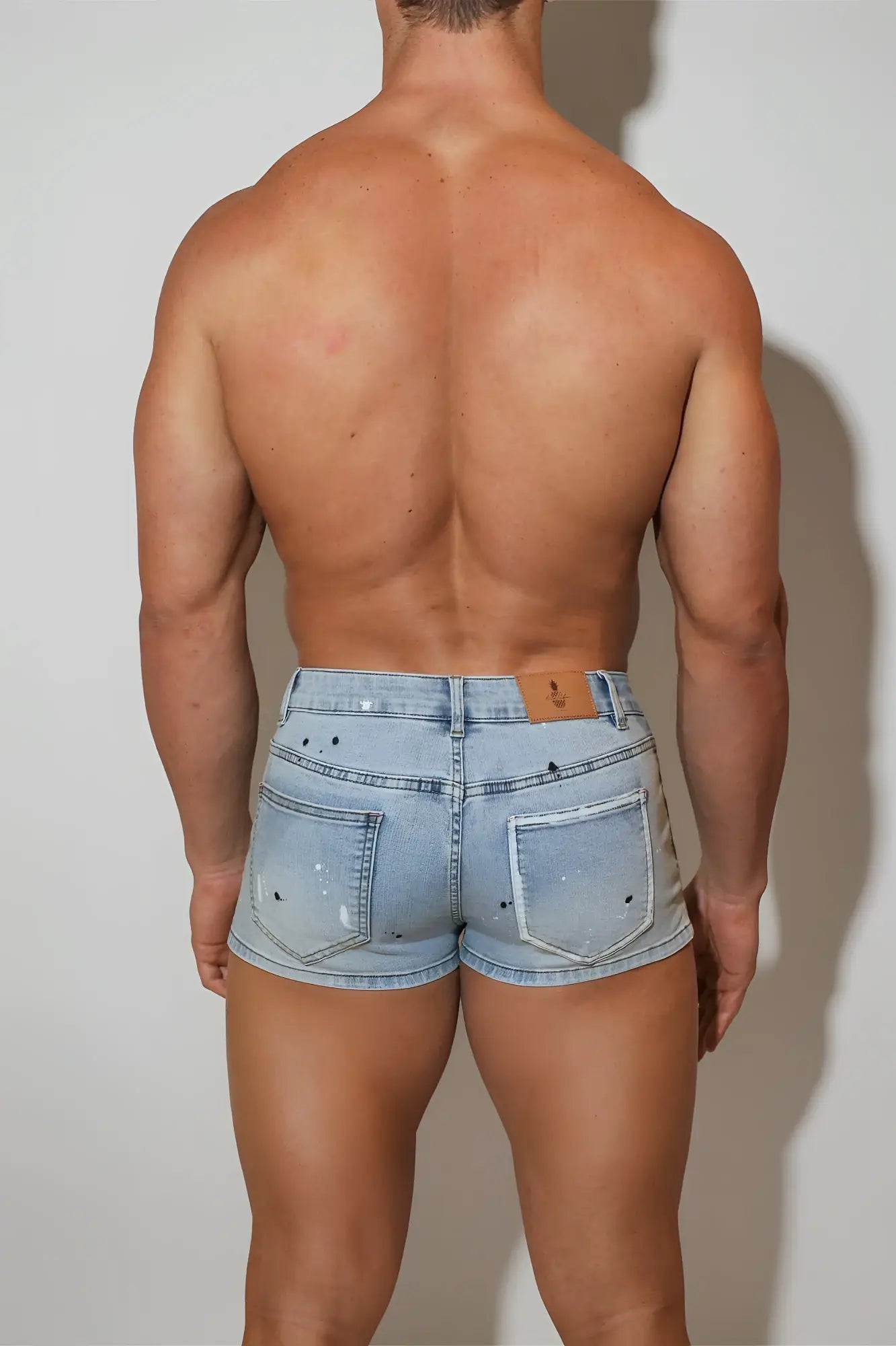 Studio splash 1.5 inch light-wash denim short shorts in sky blue with distressed speckled finish and dark stitching