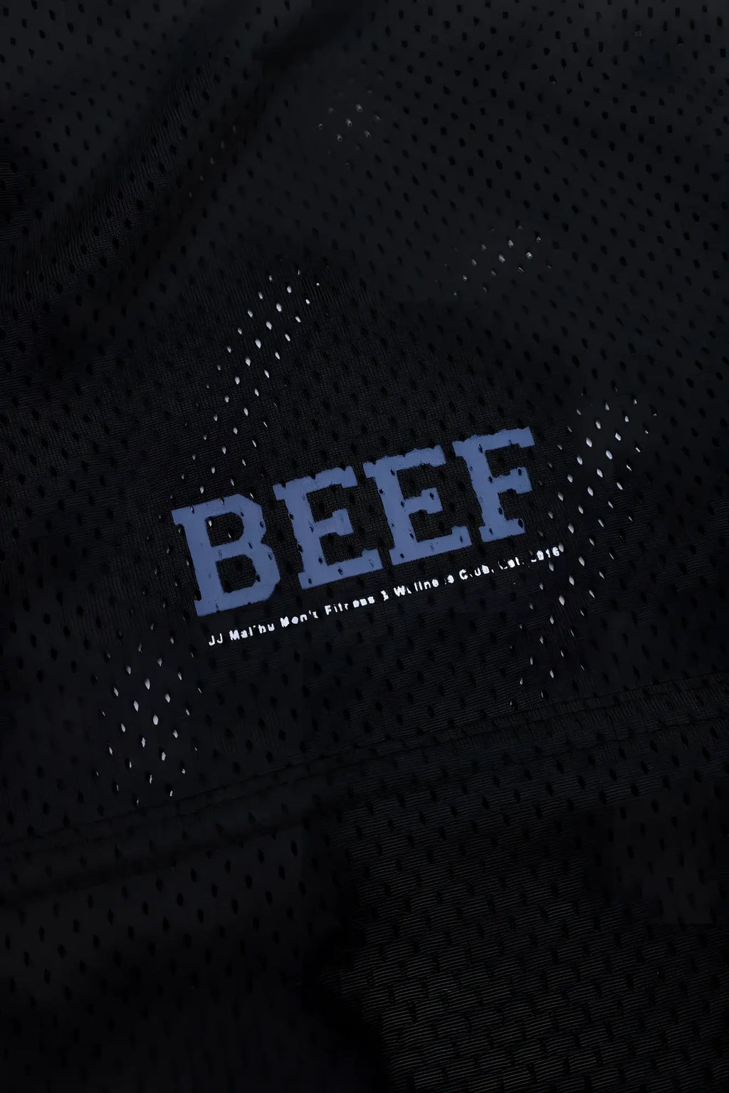 Black perforated mesh jj varsity v-neck athletic jersey with bold blue beef lettering and smaller white text beneath