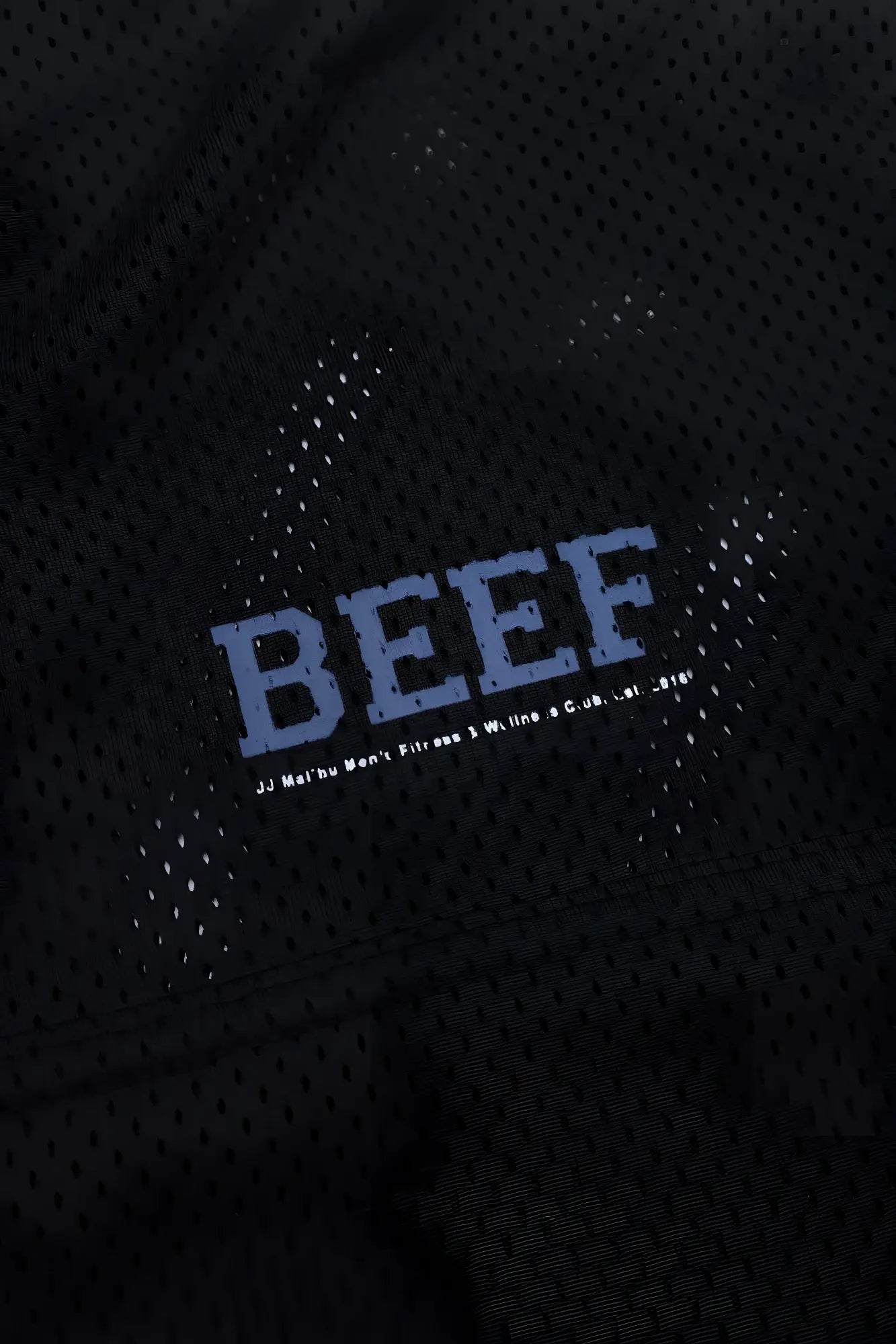 Black perforated mesh jj varsity v-neck athletic jersey with bold blue beef lettering and smaller white text beneath