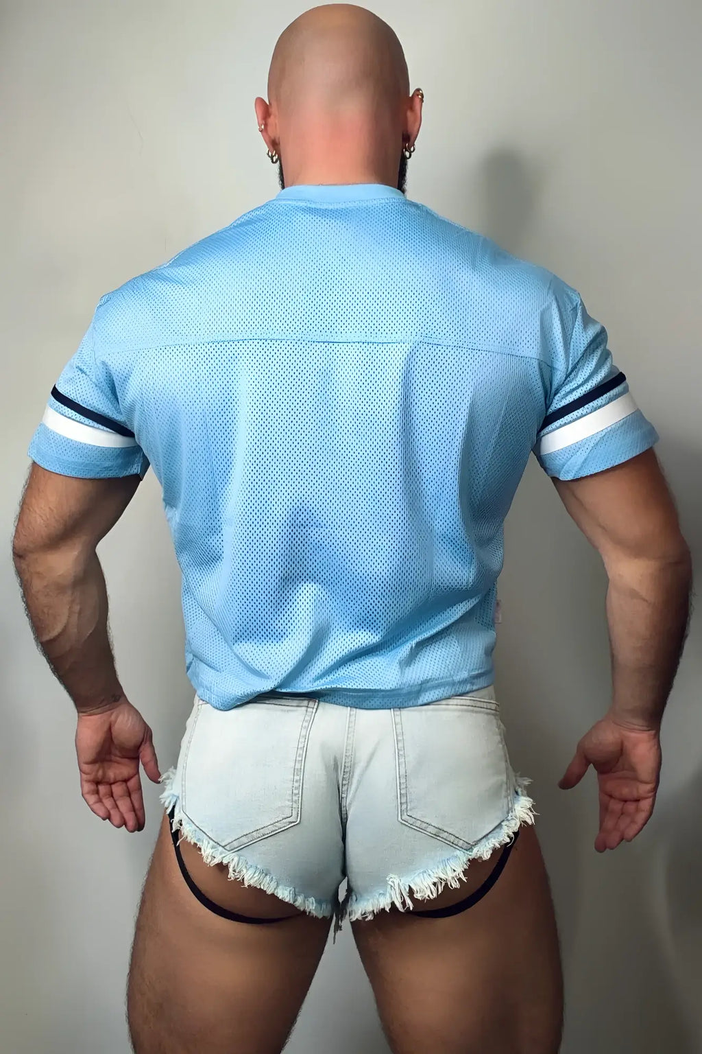 Light blue mesh jj varsity v-neck jersey with white and navy striped sleeves designed for athletic wear