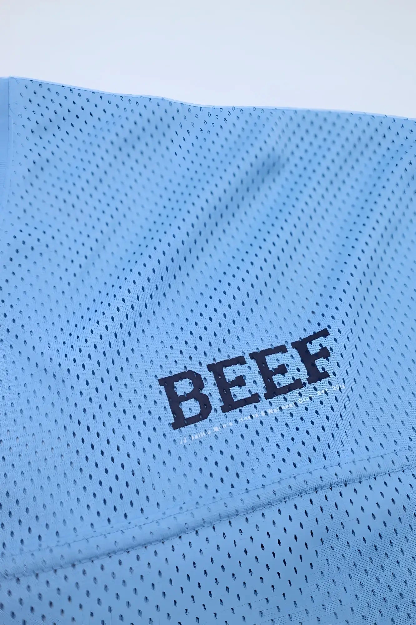 Jj varsity v-neck jersey sky blue light blue perforated mesh fabric with beef embroidered in dark navy lettering