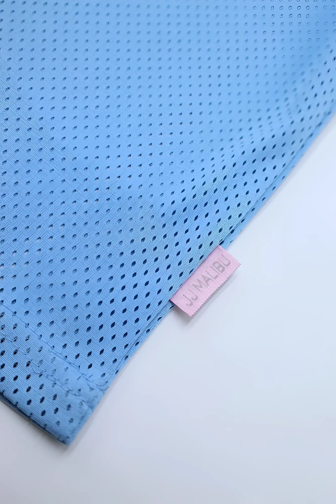 Light blue perforated mesh jj varsity v neck jersey with pink jumalbu brand tag in sky blue color