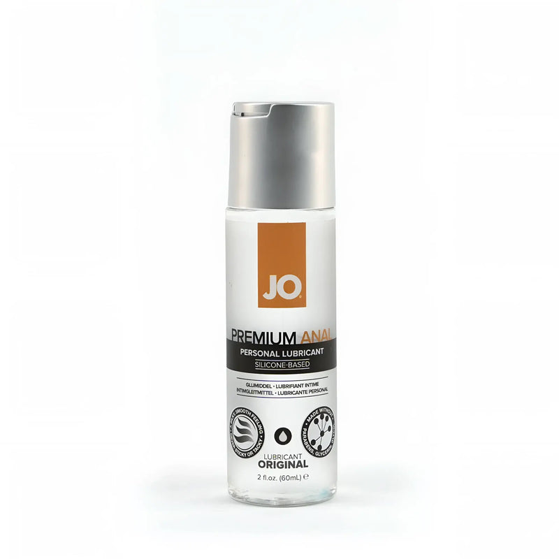 Clear glass bottle of jo premium anal original silicone lubricant with silver pump cap and orange jo logo label