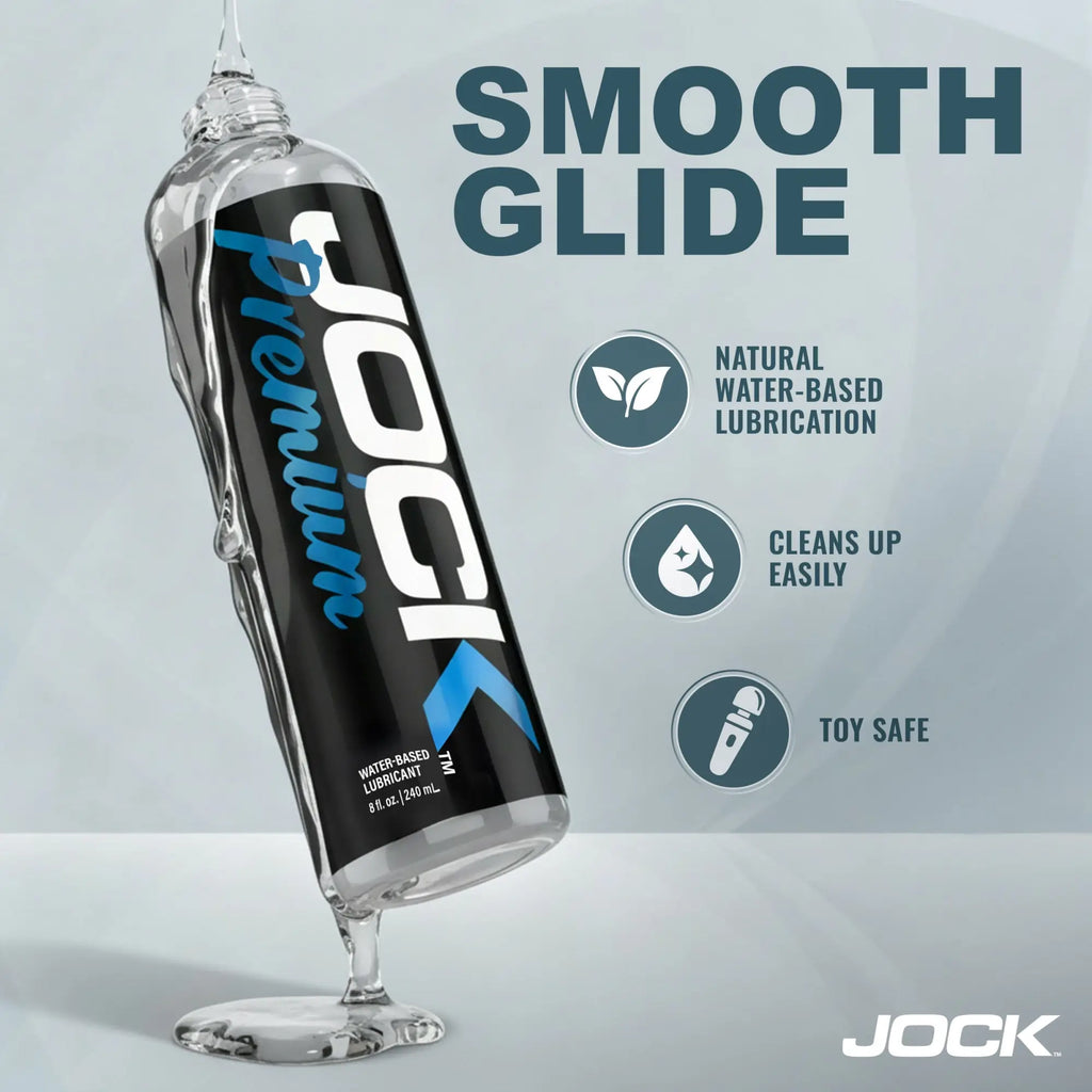 Jock 8oz Premium Water Based Lubricant bottle in black and blue, surrounded by liquid, with feature icons on the side.