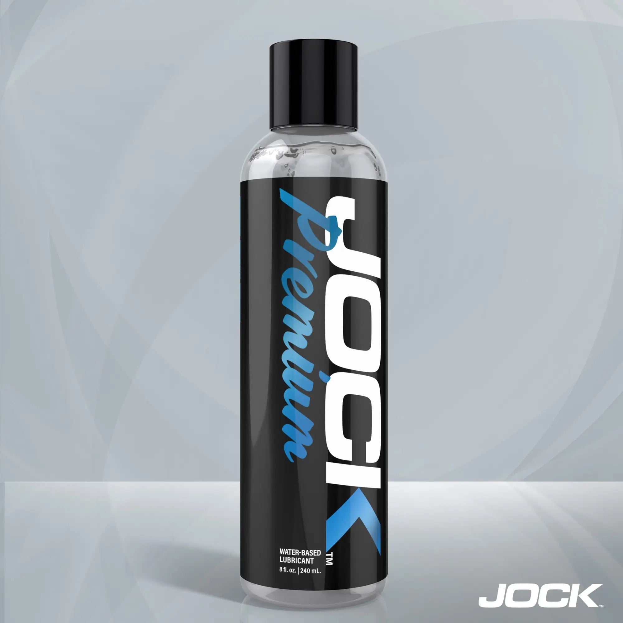 8oz clear bottle of JOCK Premium water-based lubricant with a black label, white branding, and blue accents.