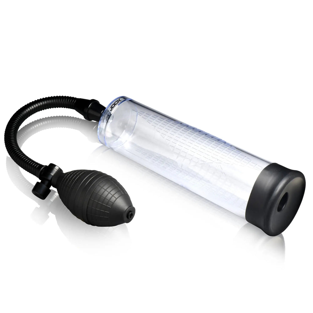 Jock Amp Up penis pump features a clear cylinder with measuring scale, black rubber base, and a black hand-pump bulb.