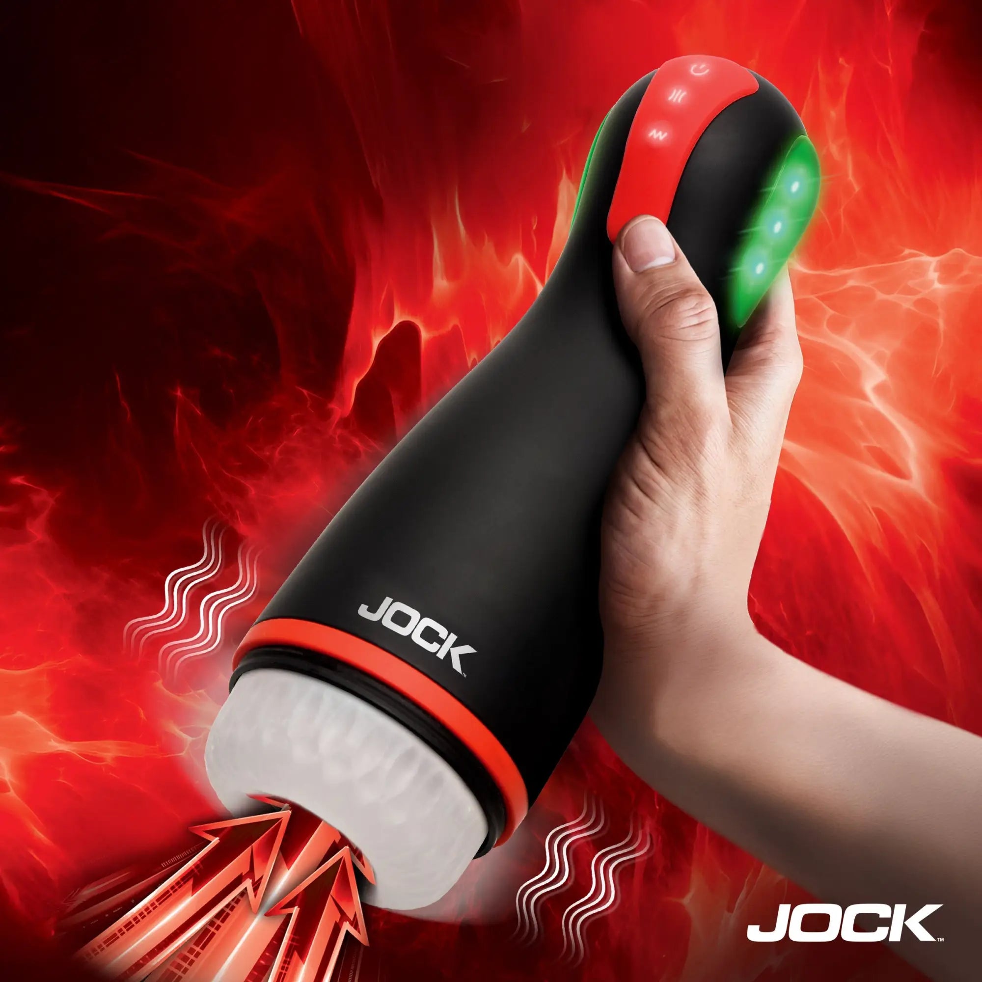 Jock Blaze vibrating masturbator in matte black with red accents, held in a hand against a stylized red flame background.