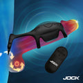 Jock Blitz black vibrating penis sleeve and c-ring with a matching wireless remote control on a blue background.