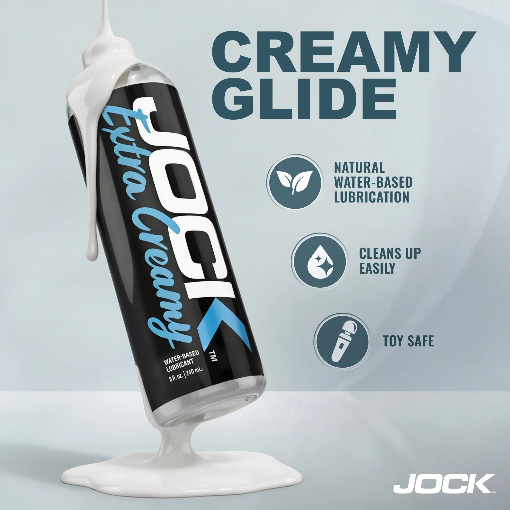 JOCK Extra Creamy 8oz lubricant bottle with white cream dripping down, blue and white text on a black label.