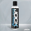 An 8oz bottle of JOCK Extra Creamy water-based lubricant, featuring a black label with white and light blue text.