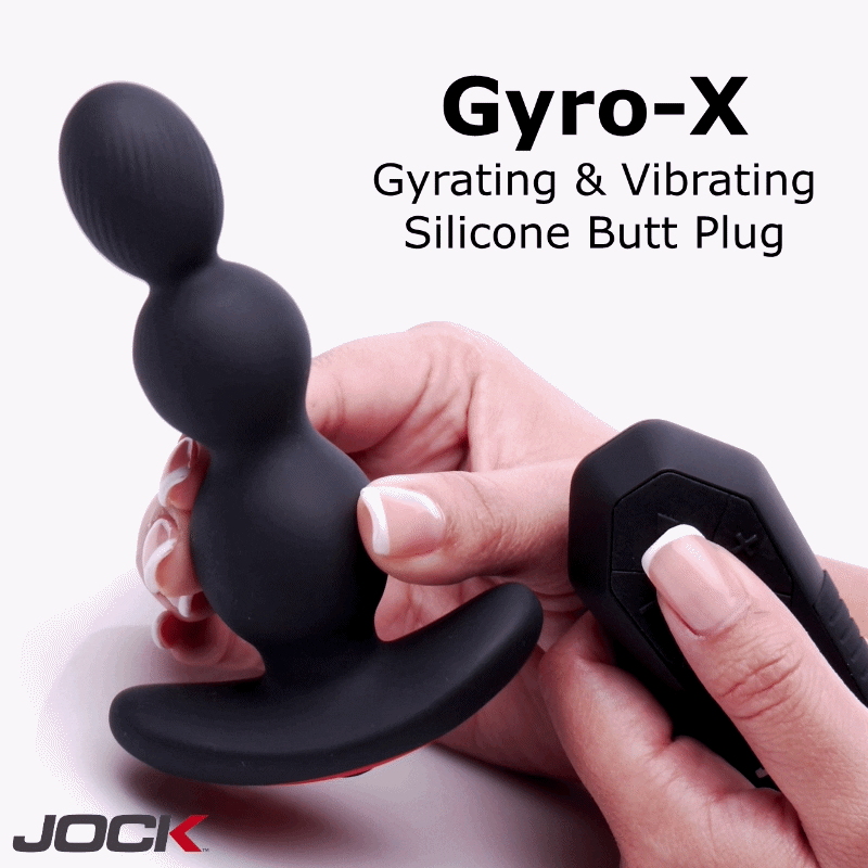 Black silicone Jock Gyro-X butt plug with three graduated spheres and remote control, held in hands.