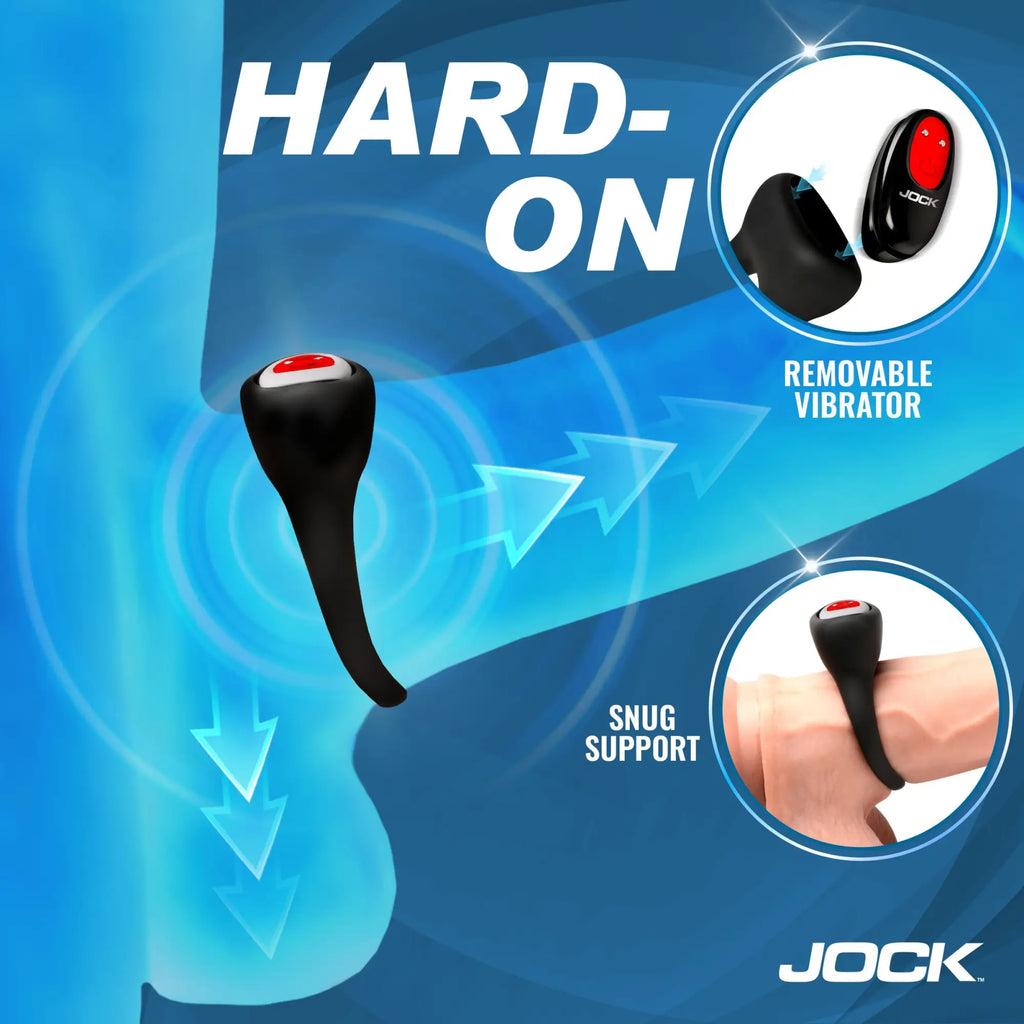 Jock Hard-On black silicone C-ring with a removable, red-buttoned vibrator, shown on a finger.