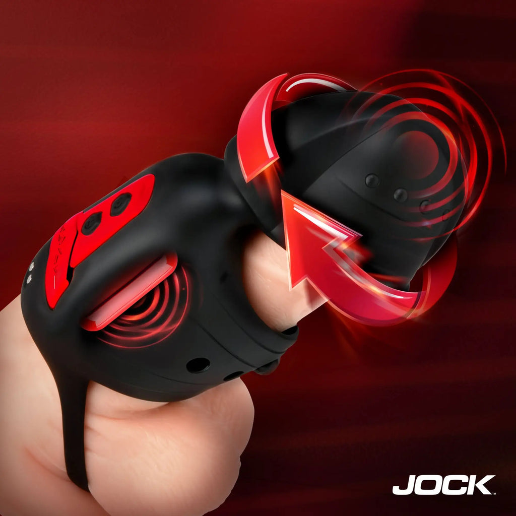 Jock Helmet Humper black and red silicone vibrating masturbator worn on a finger with glowing red motion arrows.