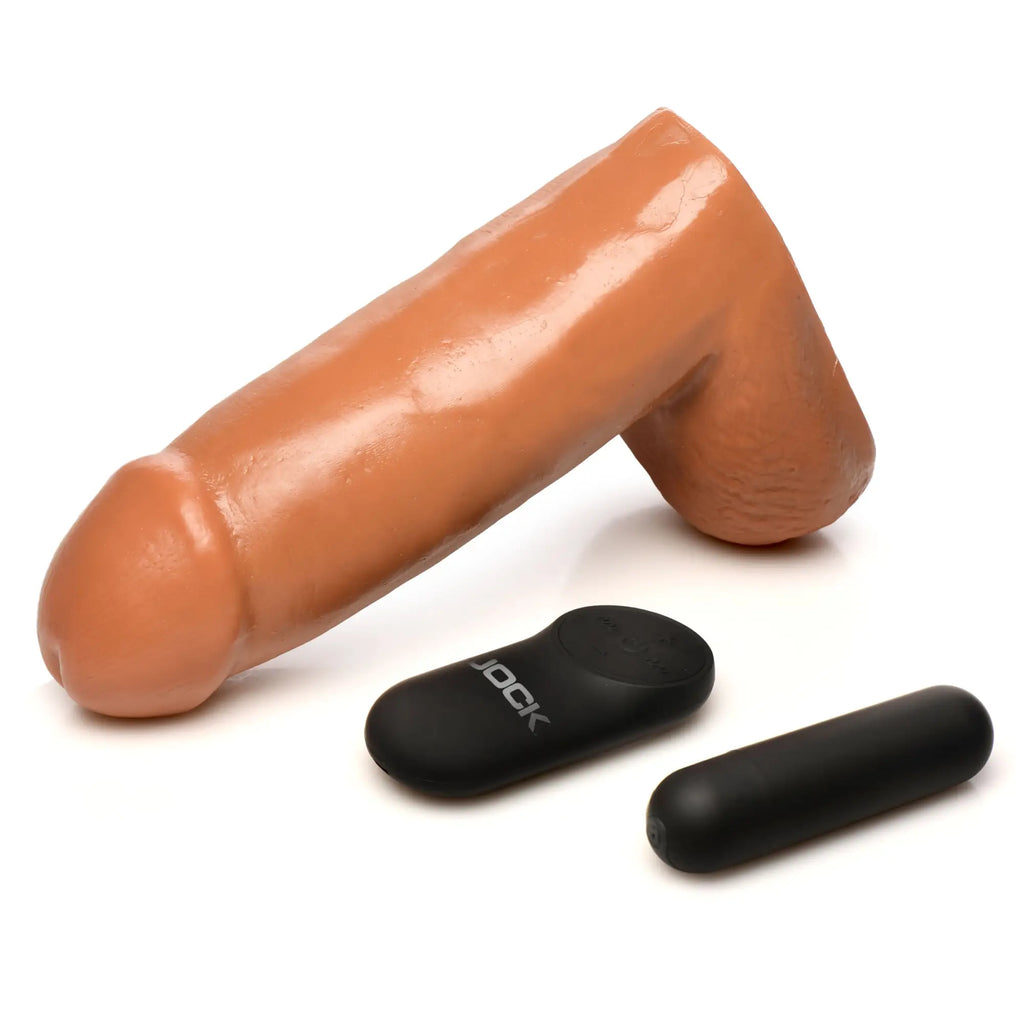 Jock Remote Control Vibrating Dildo: a realistic tan phallic toy with a black remote and a small bullet vibrator.