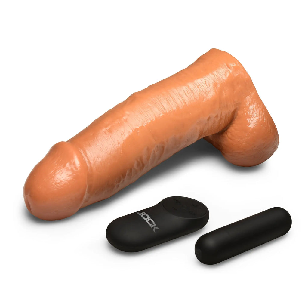 Jock Remote Control Vibrating Dildo: A tan, realistic-style dildo with a black wireless remote and bullet vibrator.