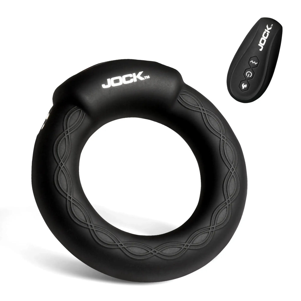 Black Jock Rumbler vibrating and warming cock ring with patterned texture and matching wireless remote control.