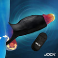 Jock Surge black vibrating penis sleeve and c-ring with a matching remote, shown against a blue background.