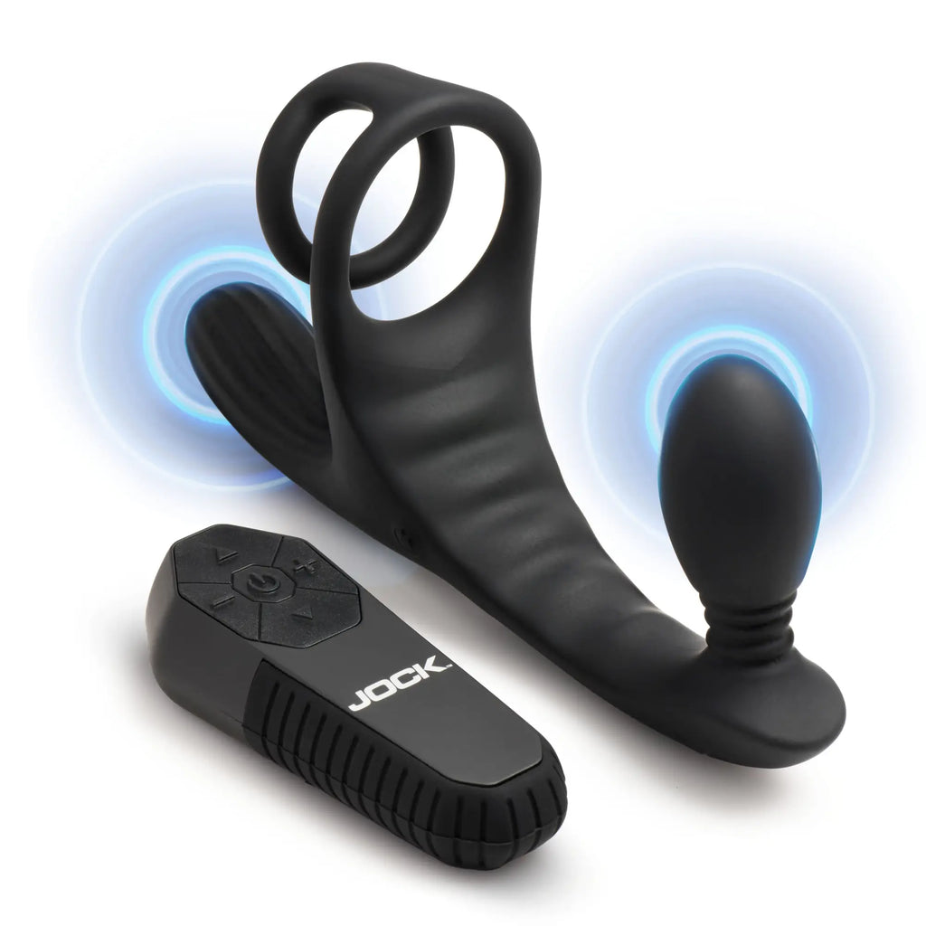 Black Jock Triple Rush vibrating C-ring and anal plug with a handheld remote control, shown on a white background.