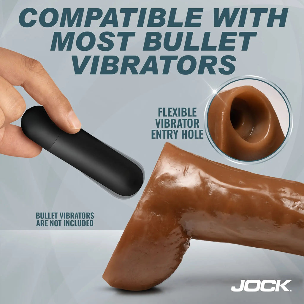 Jock 10-inch brown dildo with balls, showing a flexible internal hole designed for a black bullet vibrator insertion.