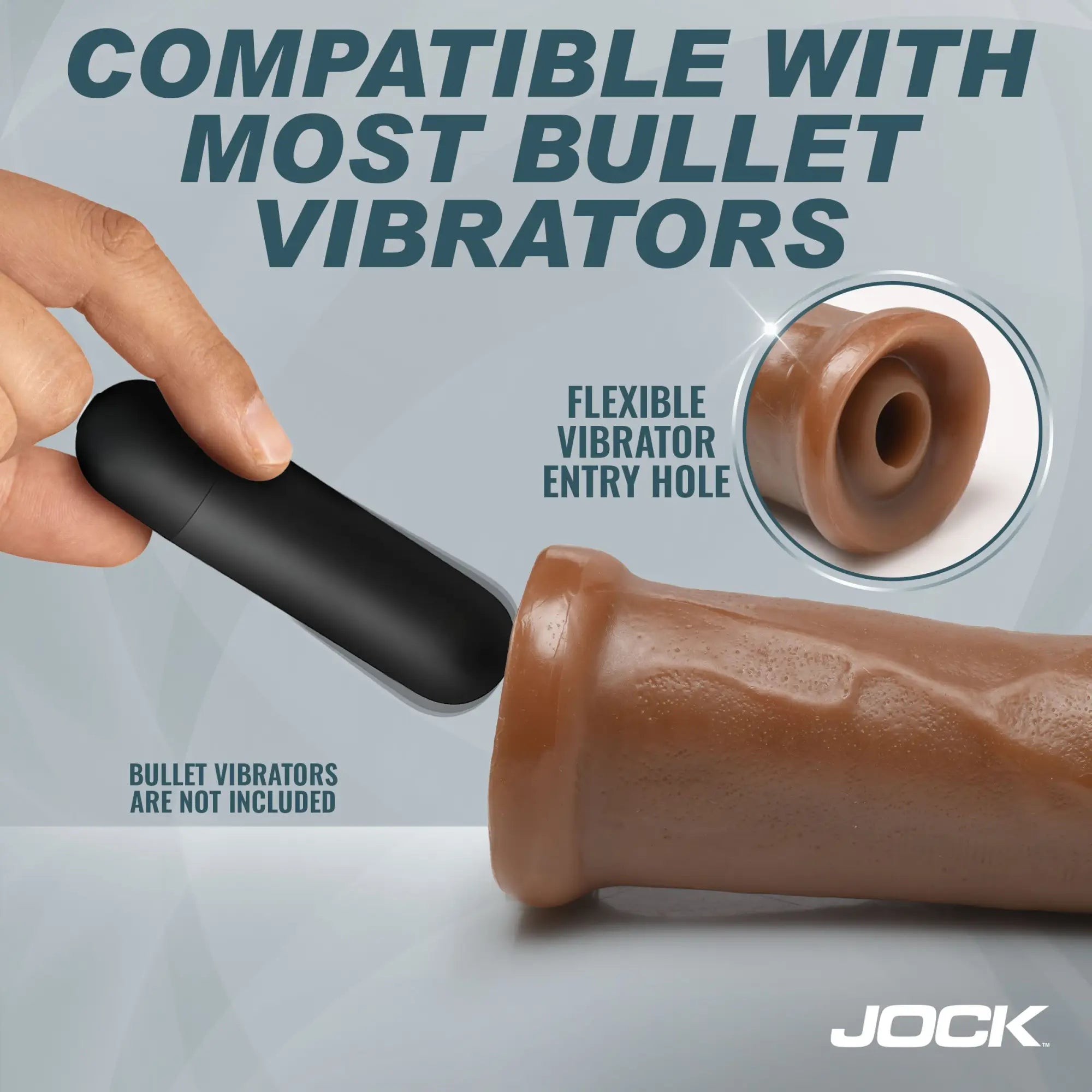 A hand inserts a black bullet vibrator into the brown, textured, realistic Jock Jock’s dildo.