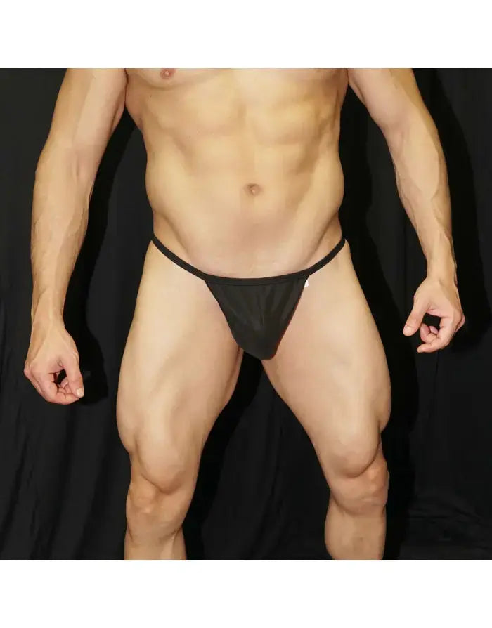 Black jockstrap underwear by Arroyman featuring a minimal design and elastic waistband shown on a model.