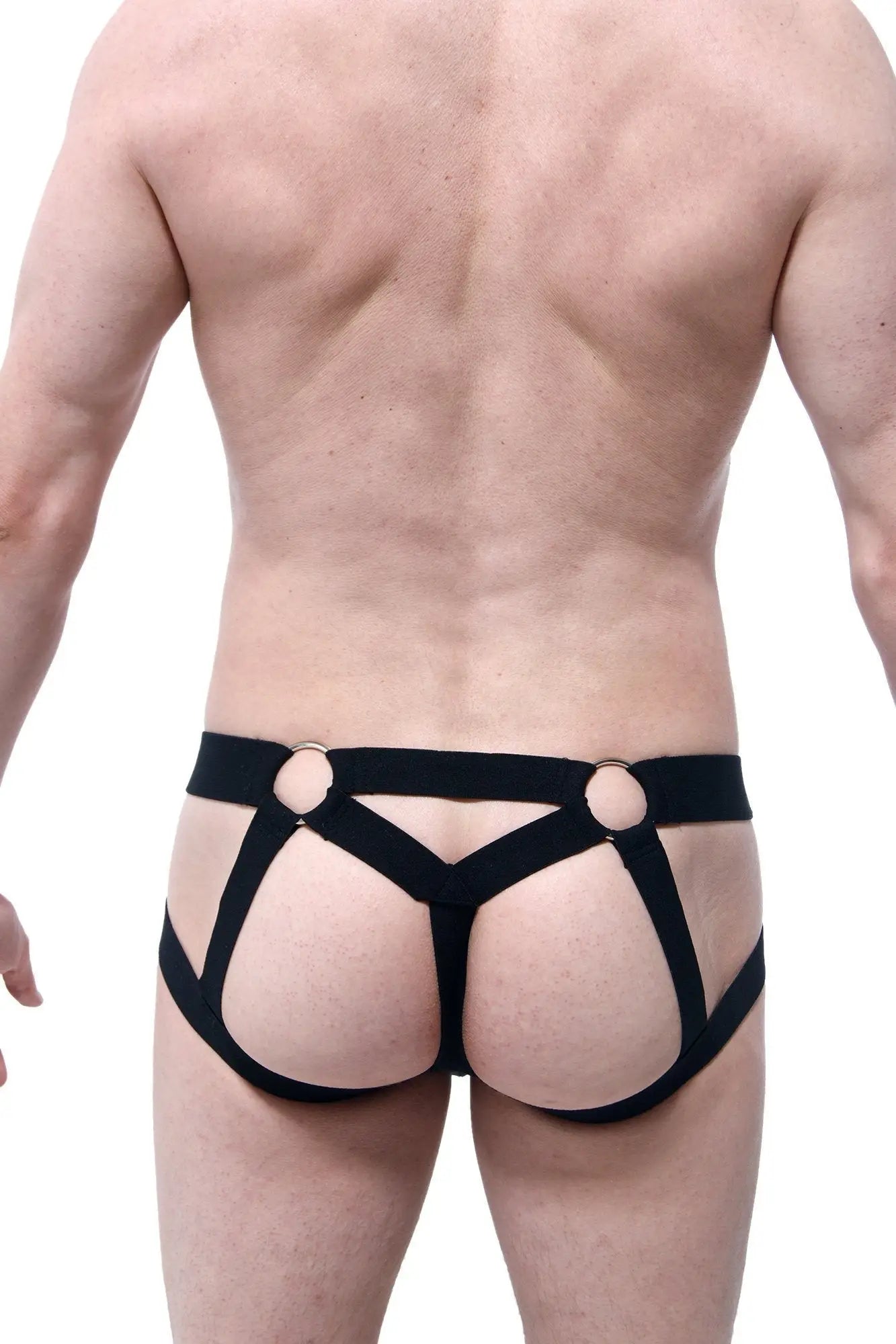 Black harness-style jockstring beast briefs with gold-toned metal rings at the waistband front view