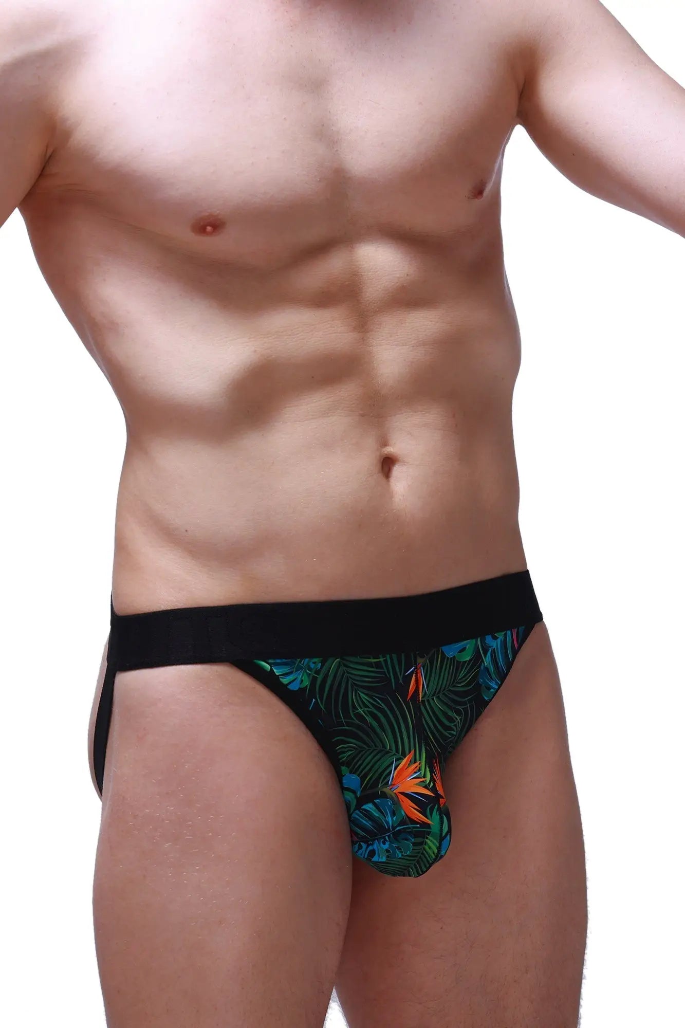 Black and green tropical leaf-patterned jockstrap with orange bird accents designed for comfortable support