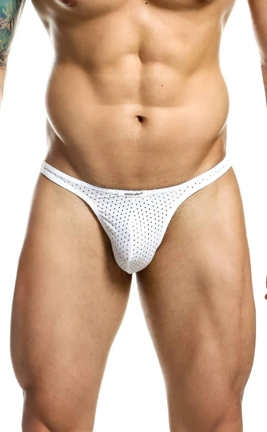 White mesh thong with small black dots by joe snyder shown from the back side featuring breathable fabric