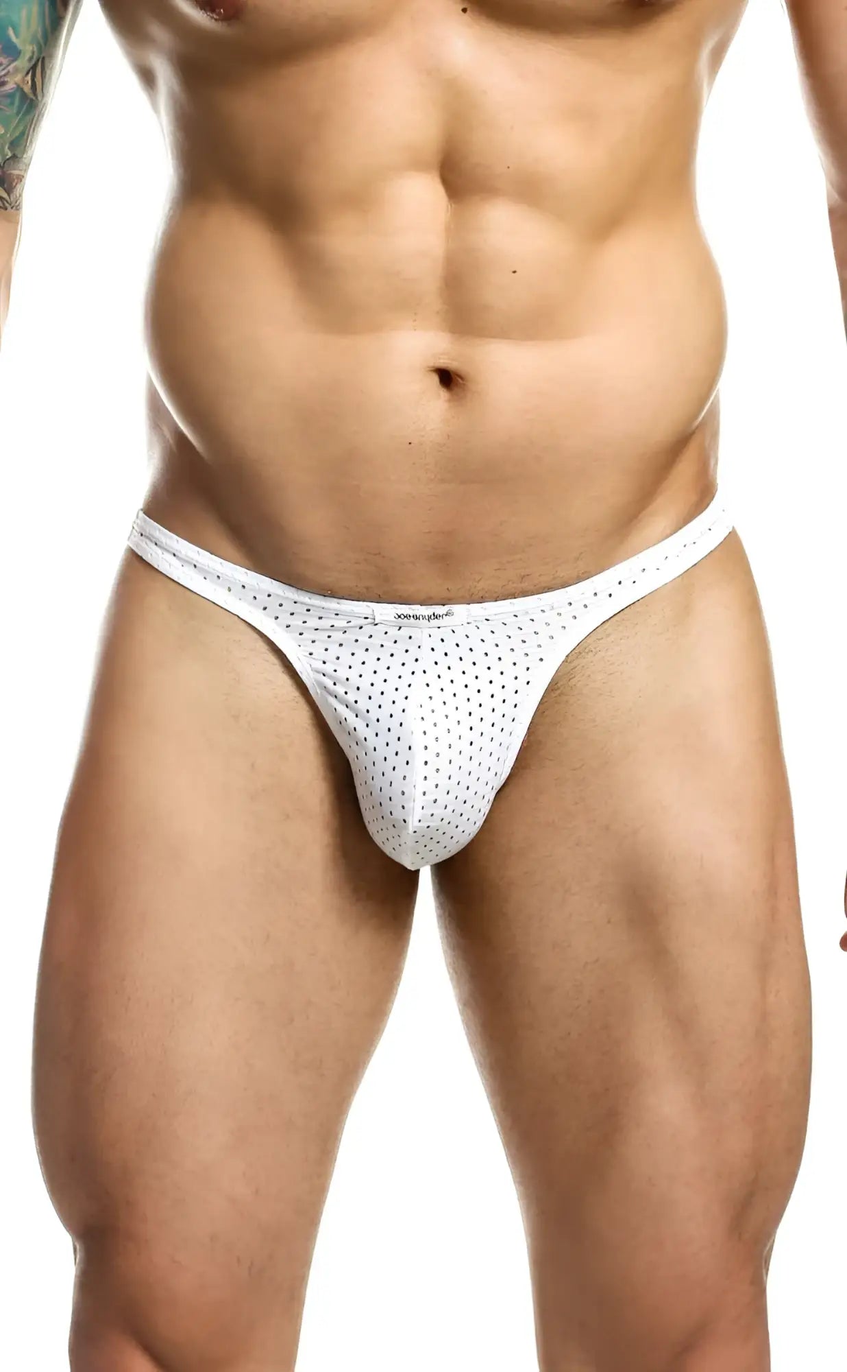 White mesh thong with small black dots by joe snyder shown from the back side featuring breathable fabric