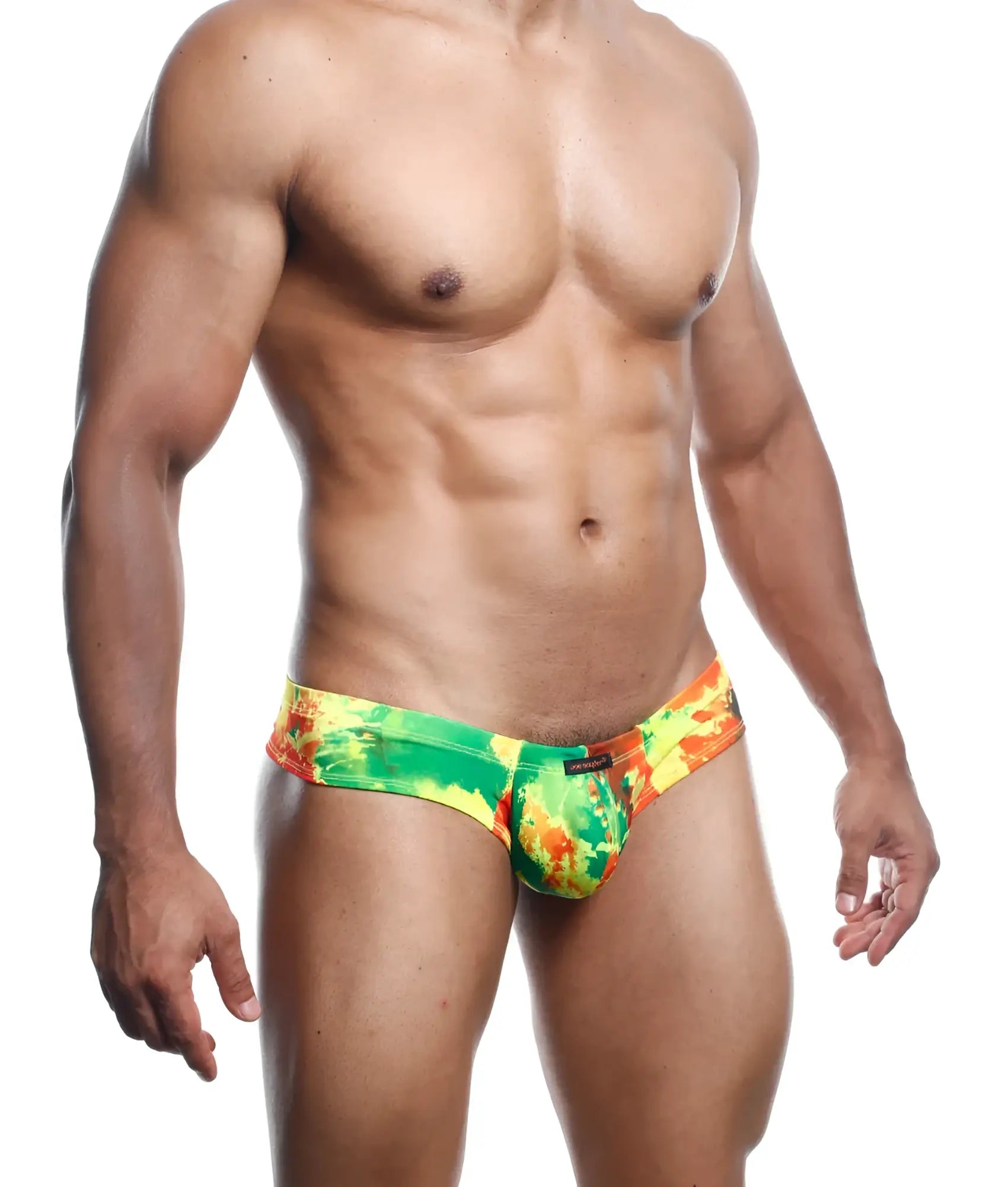 Joe snyder mini cheek vibrant tie-dye swim trunks in green yellow and orange hues perfect for beachwear
