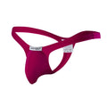 A vibrant magenta joe snyder polyester bulge tanga thong with smooth stretchy fabric and form-fitting design
