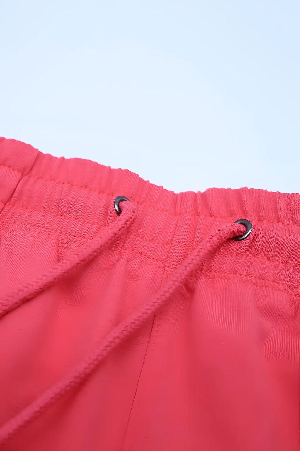 Pink drawstring jogger pants with black metal eyelets from joie limited edition cherry red collection