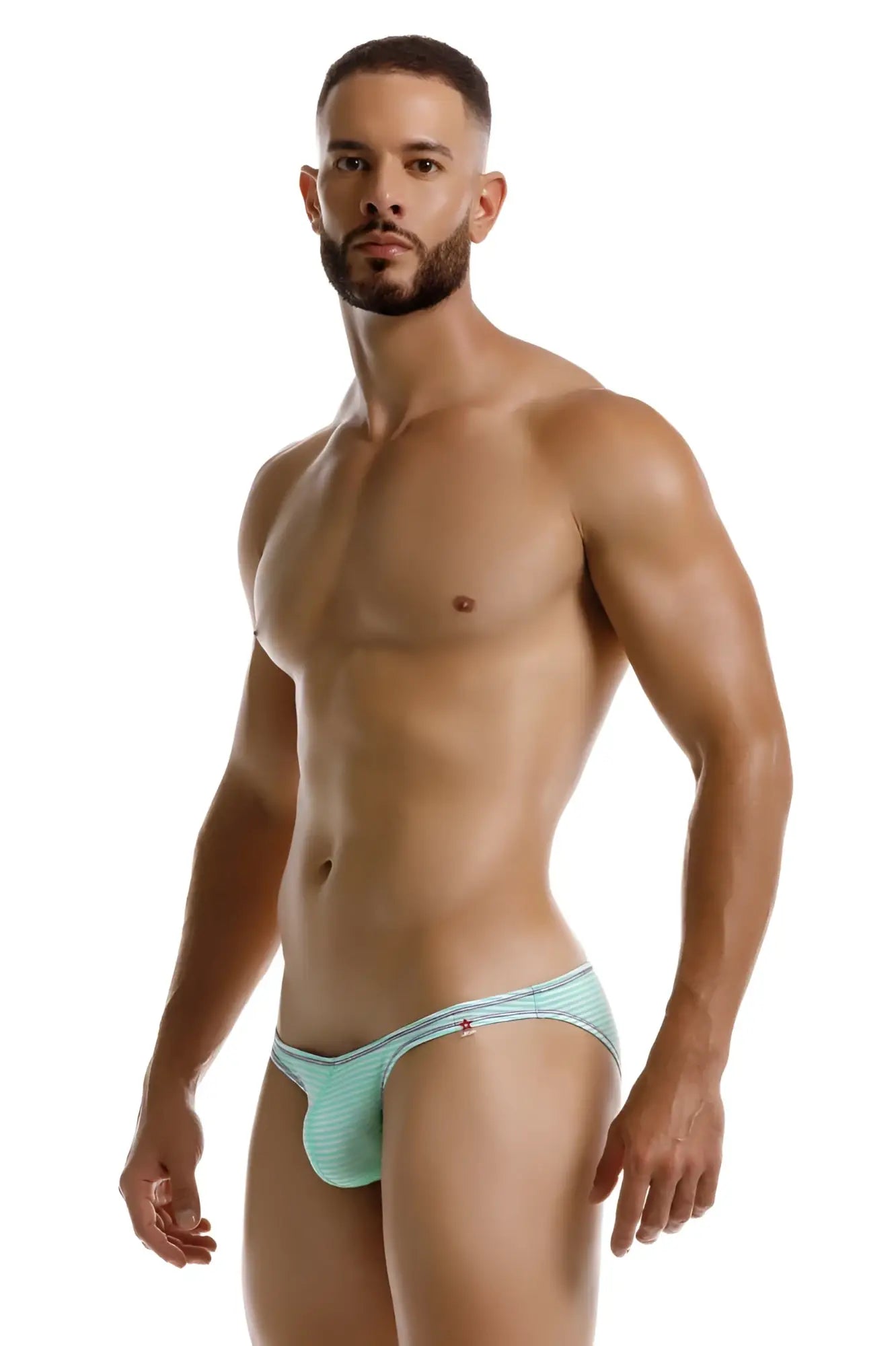 Mint green jor 2249 sour bikini briefs with textured fabric, subtle stripes, and a small red side logo