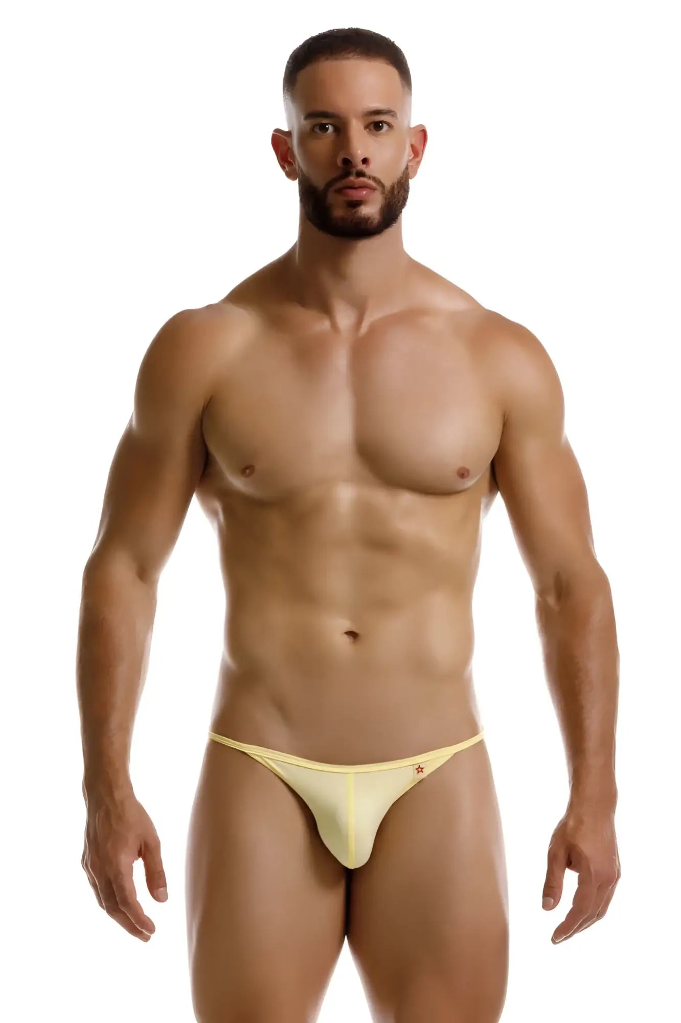 Yellow form-fitting JOR 2258 Axel g-string thong with subtle red logo on left hipband shown from the back side
