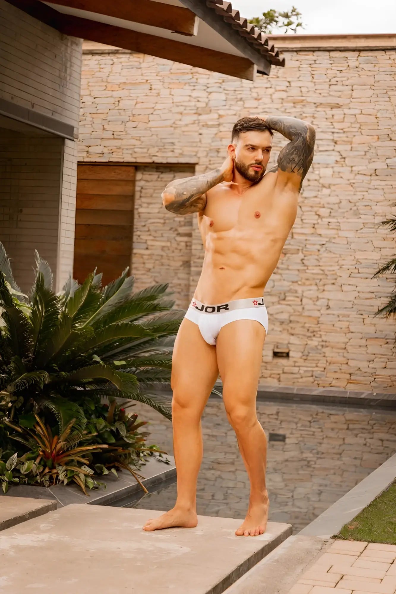 White jor 2331 cronos briefs featuring a subtle logo waistband in soft white fabric for comfortable wear