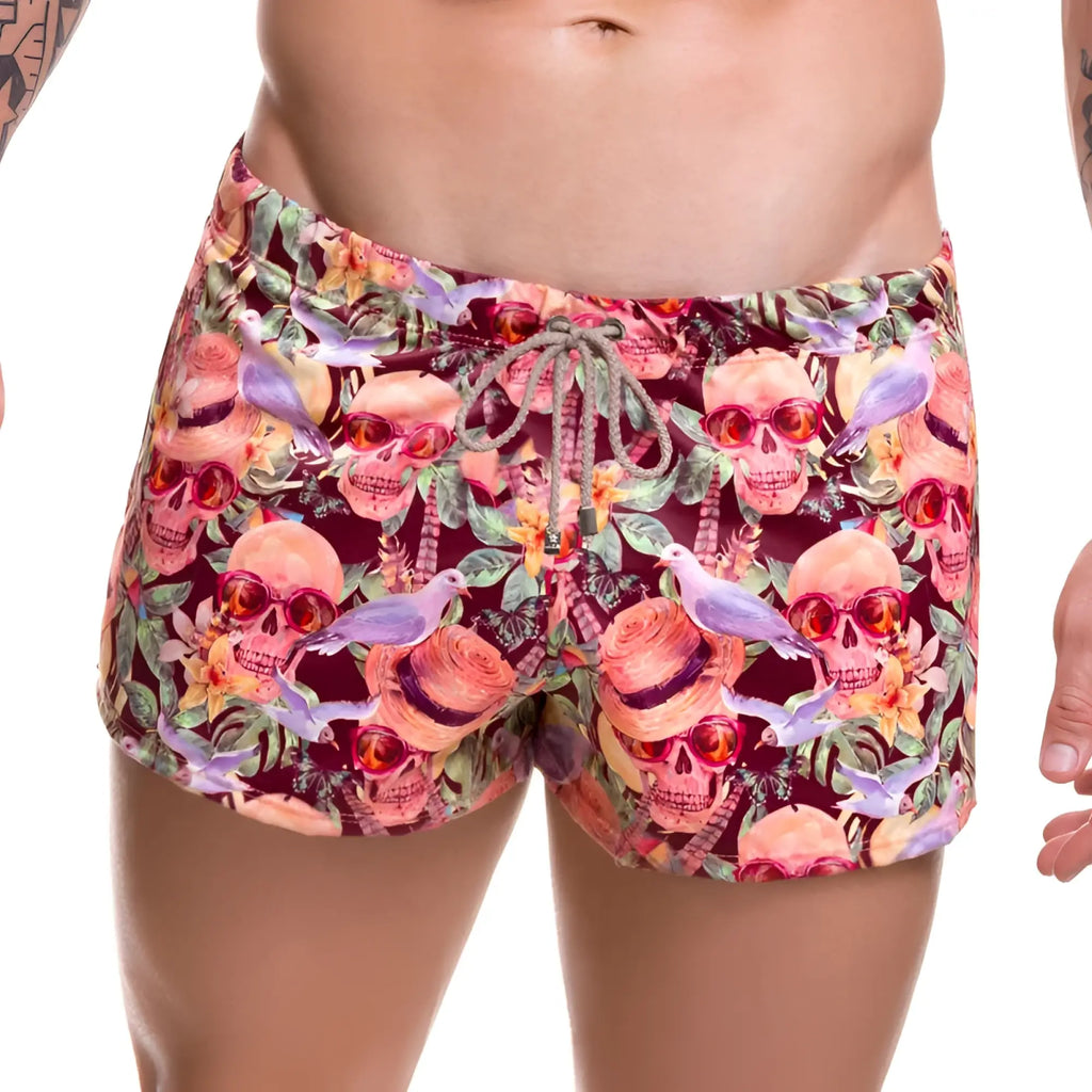 Jor arrecife mojito mini shorts swimwear in vibrant pink and maroon with skulls sunglasses tropical flowers and purple birds