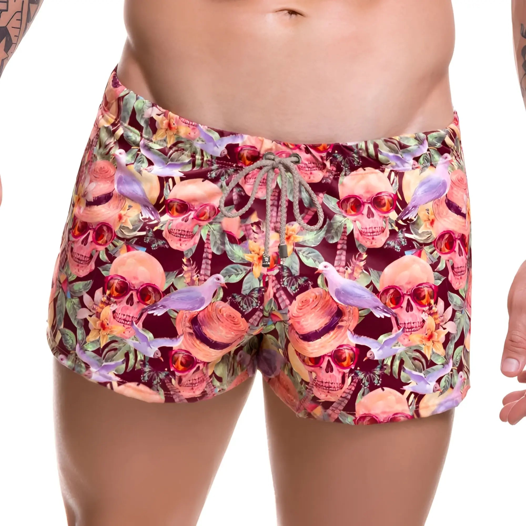 Jor arrecife mojito mini shorts swimwear in vibrant pink and maroon with skulls sunglasses tropical flowers and purple birds
