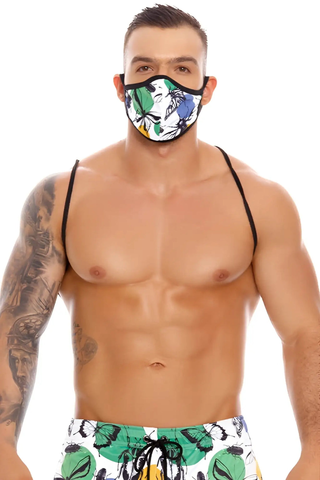 Jor Beetle Mask 1321 with vibrant tropical leaf and butterfly pattern face mask with black trim in one size