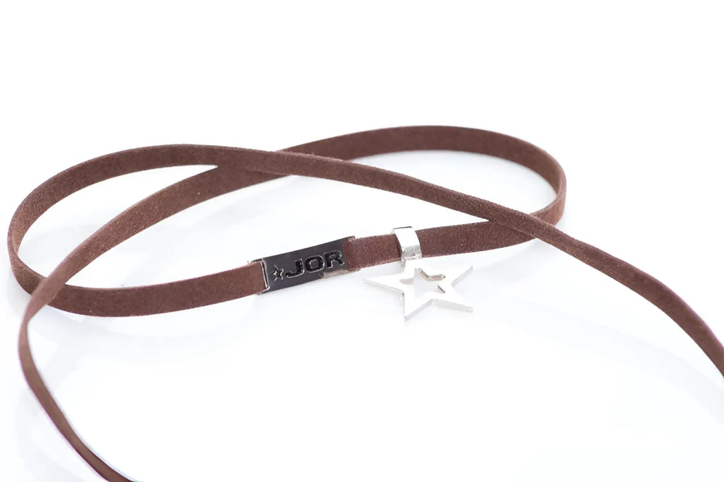 Brown suede choker bracelet with silver star pendant and black rectangular jor tag size one size
