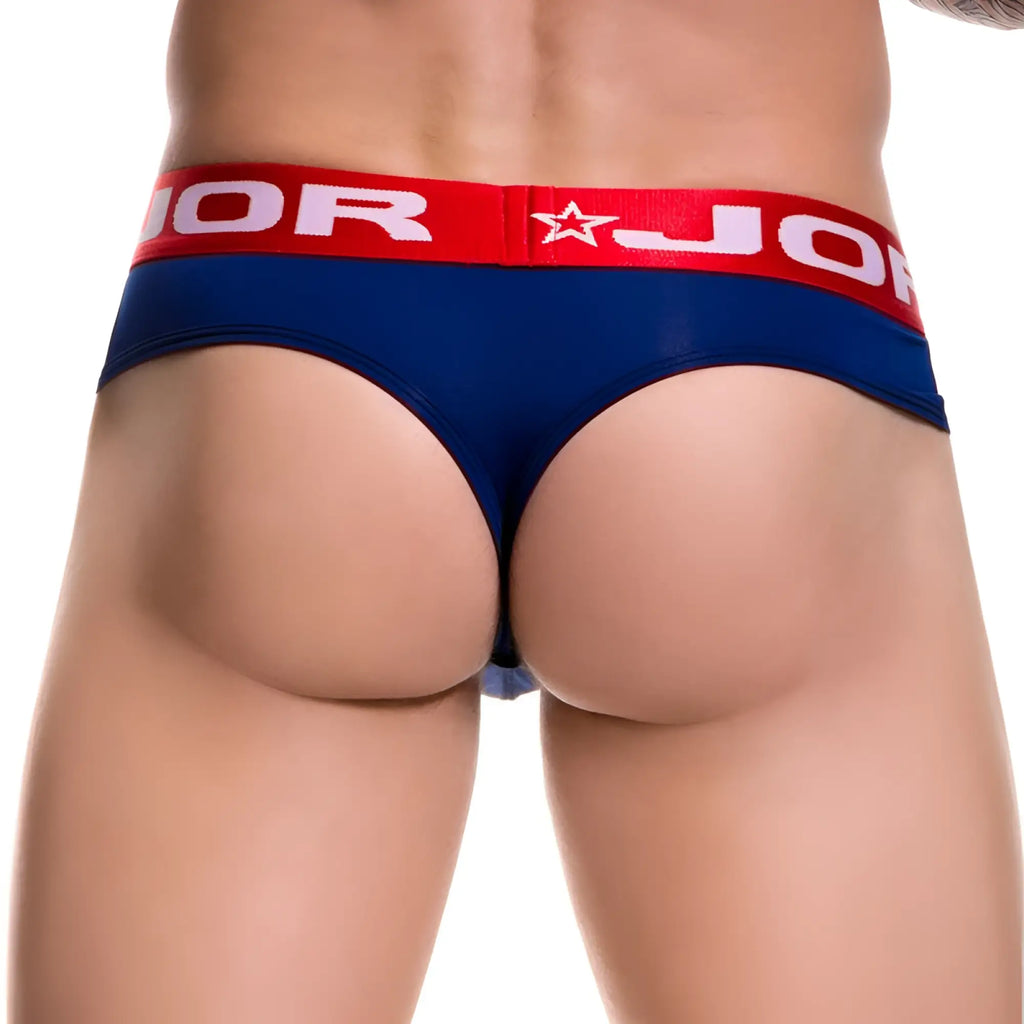 Navy blue bikini thong underwear with a red waistband featuring white jor lettering and a star logo size s
