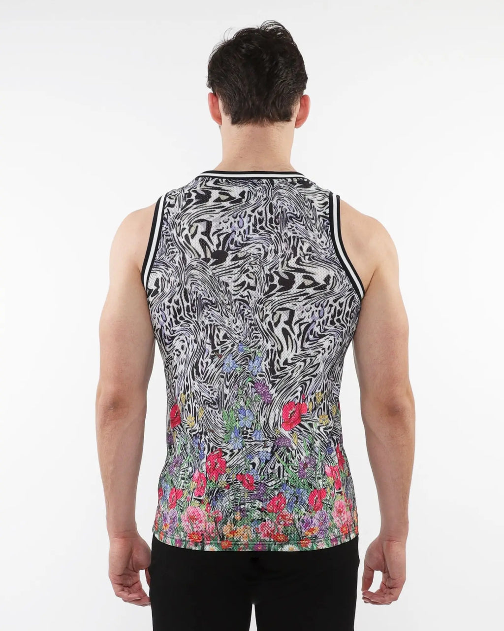 Black and white abstract swirl mesh tank top with colorful floral print and stripe ribbing at the bottom front