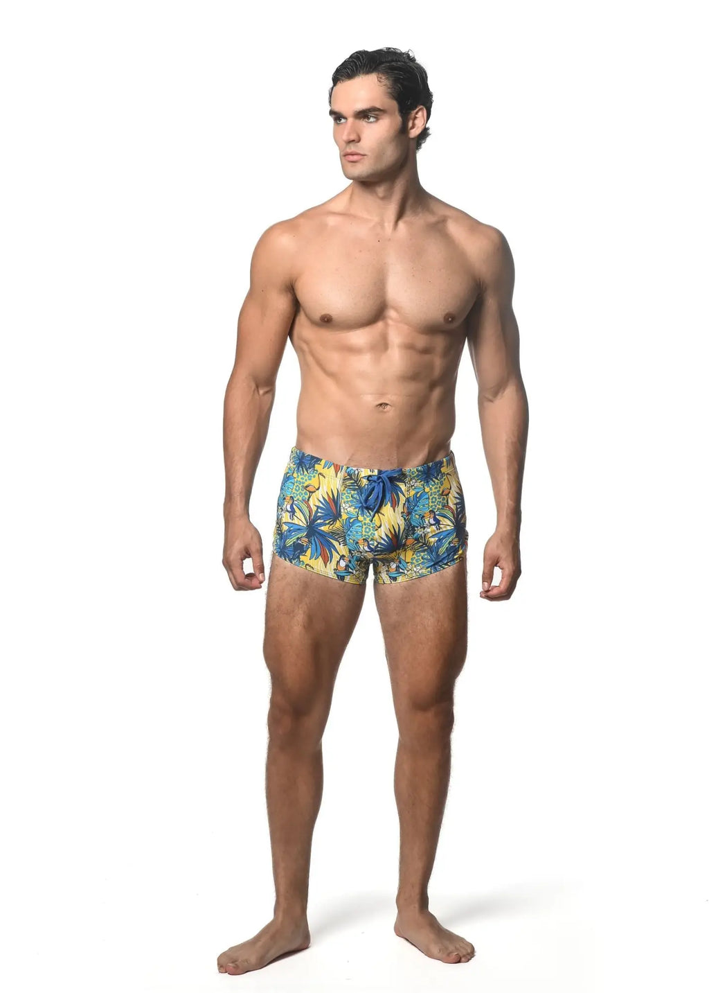 Men’s jungle printed swim trunk with vibrant tropical blue and yellow leaf pattern perfect for beachwear