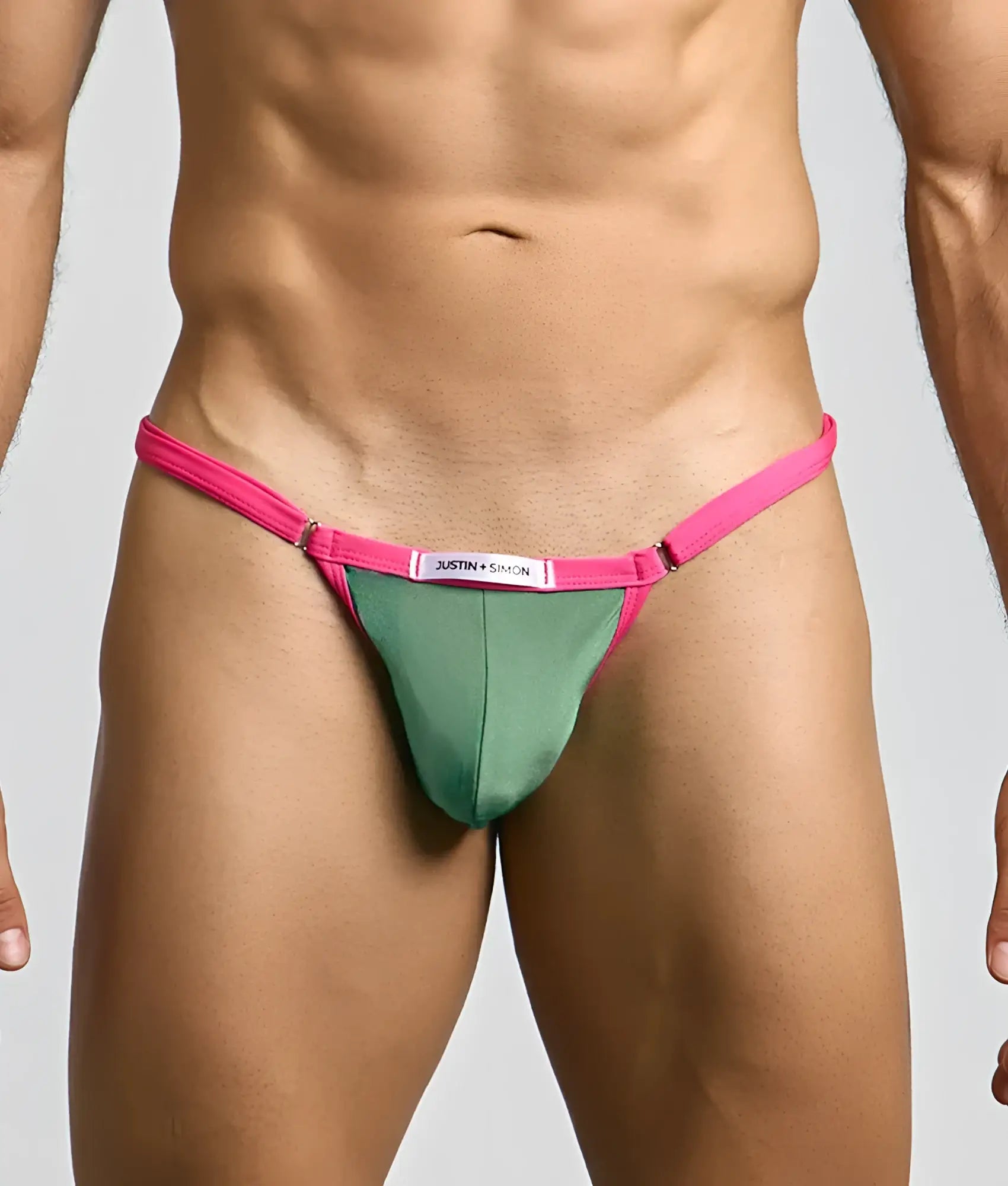Bright pink and sage green justin and samson thong with sleek minimalist design in the justin + simon bikini one collection