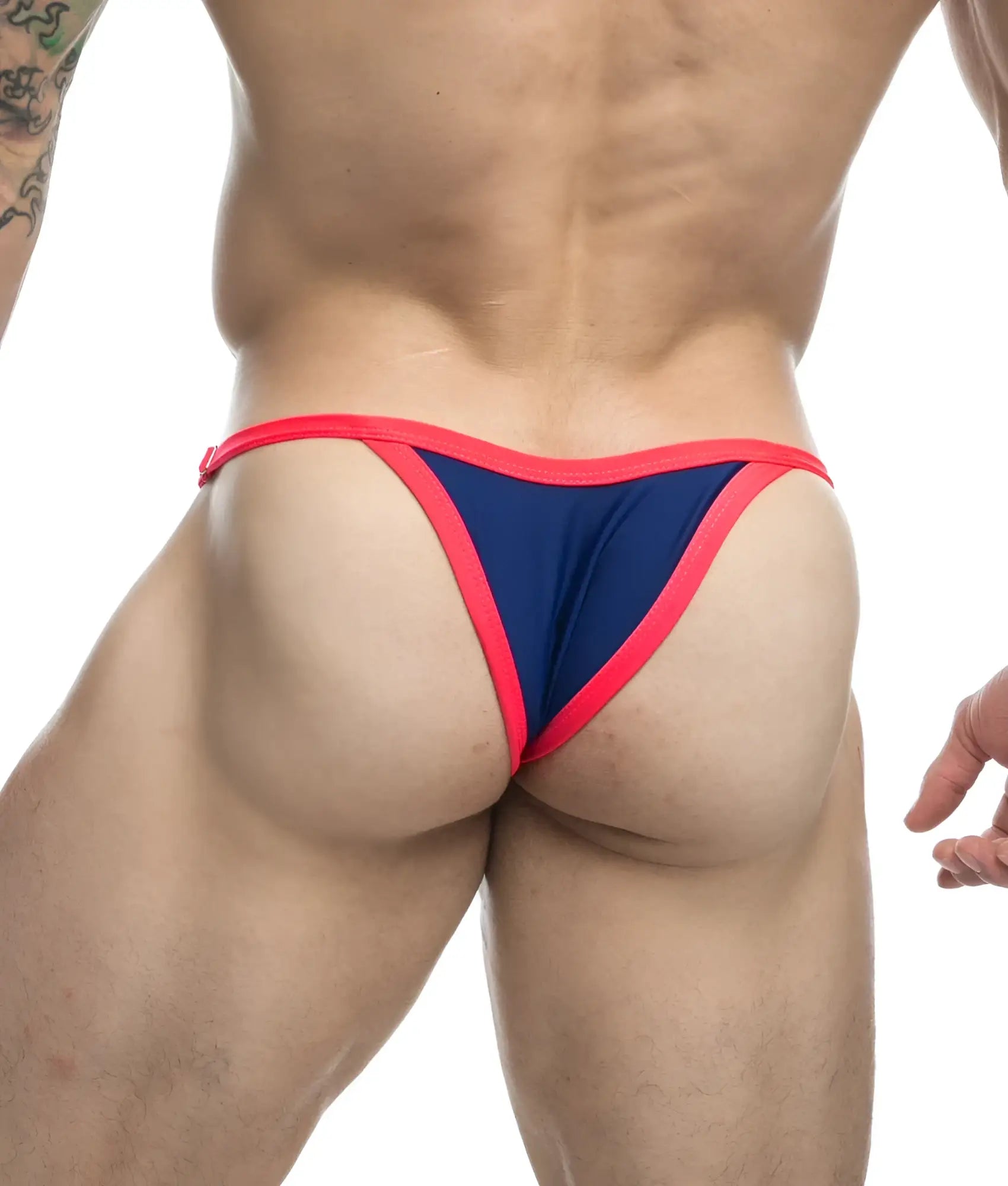 Navy blue and neon pink thong from Justin + Simon bikini one with a sleek, form-fitting design shown from the back