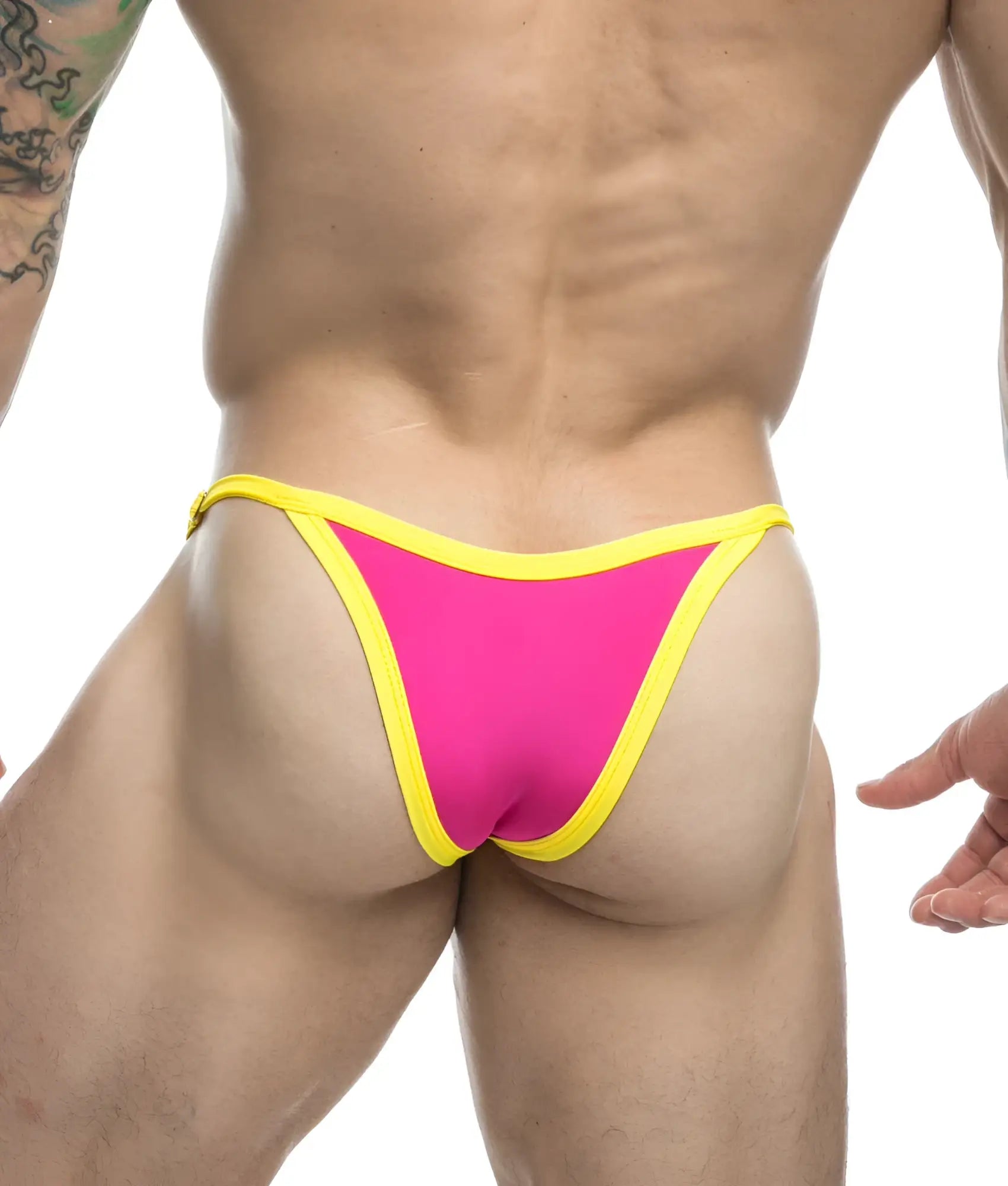 Vibrant pink and yellow thong swimsuit from justin + simon bikini one with a snug, form-fitting design