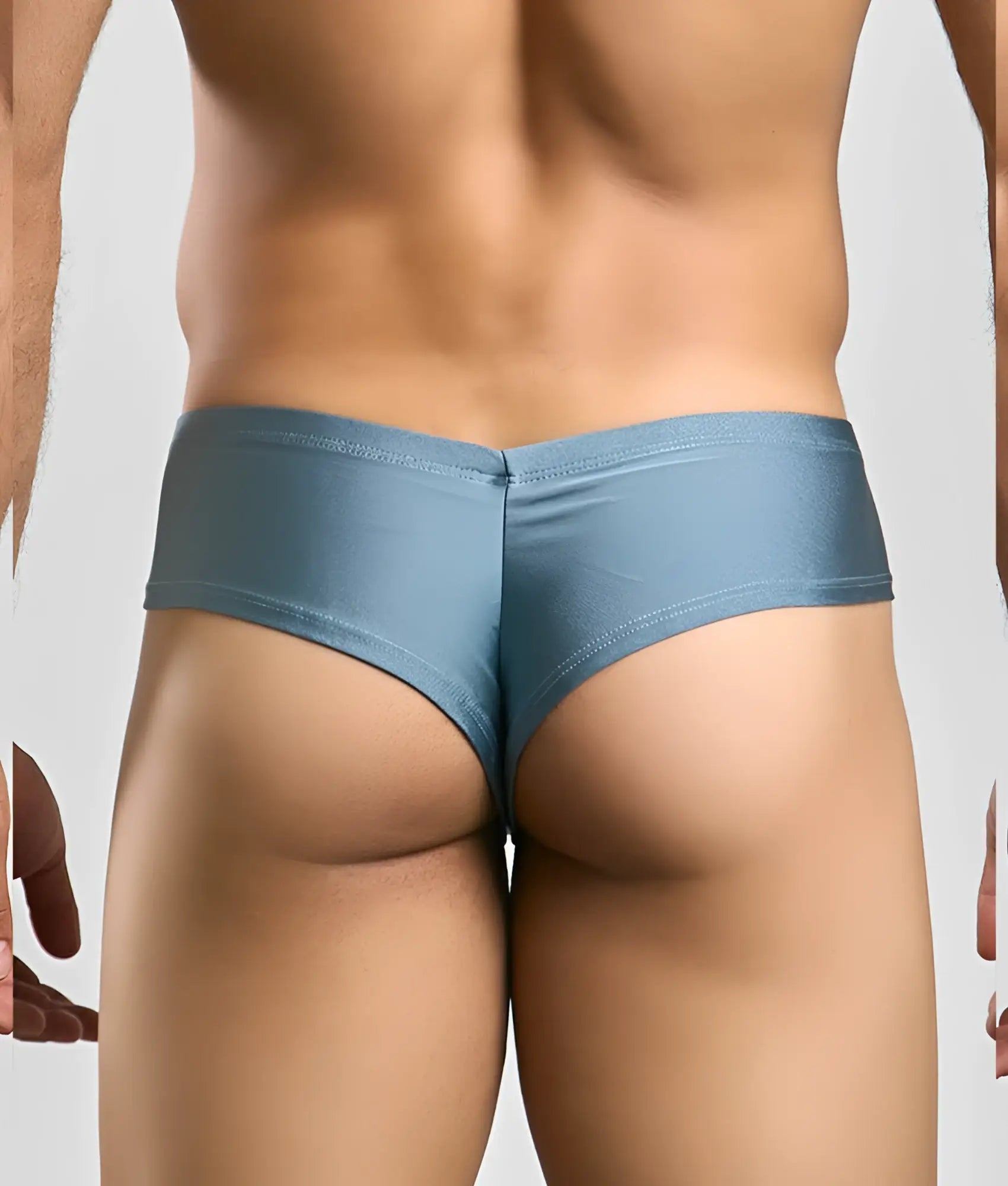Blue metallic briefs with a sleek form-fitting design by justin simon cheek