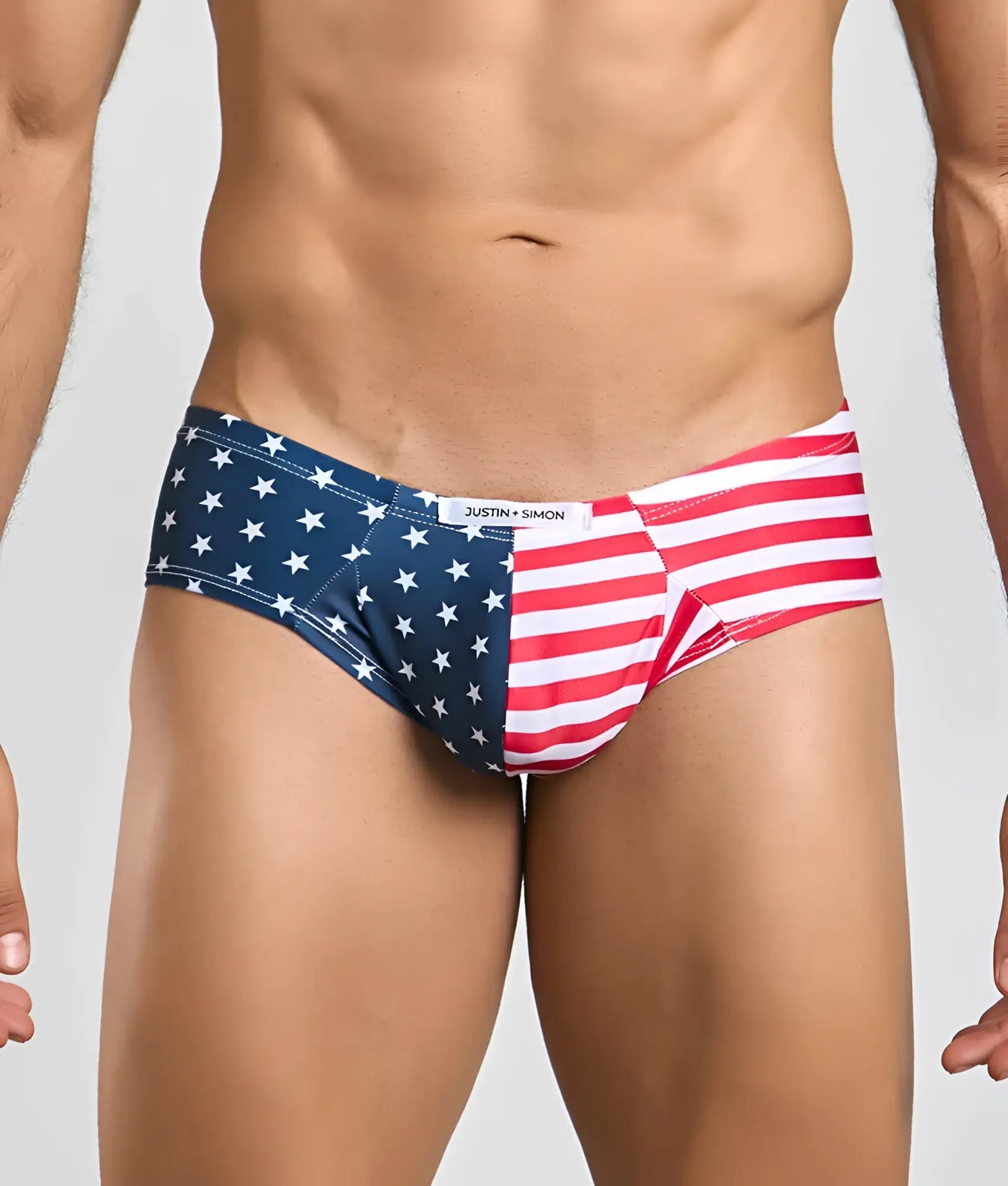 Blue and red american flag patterned briefs with white stars and stripes featuring justin plus simon brand label