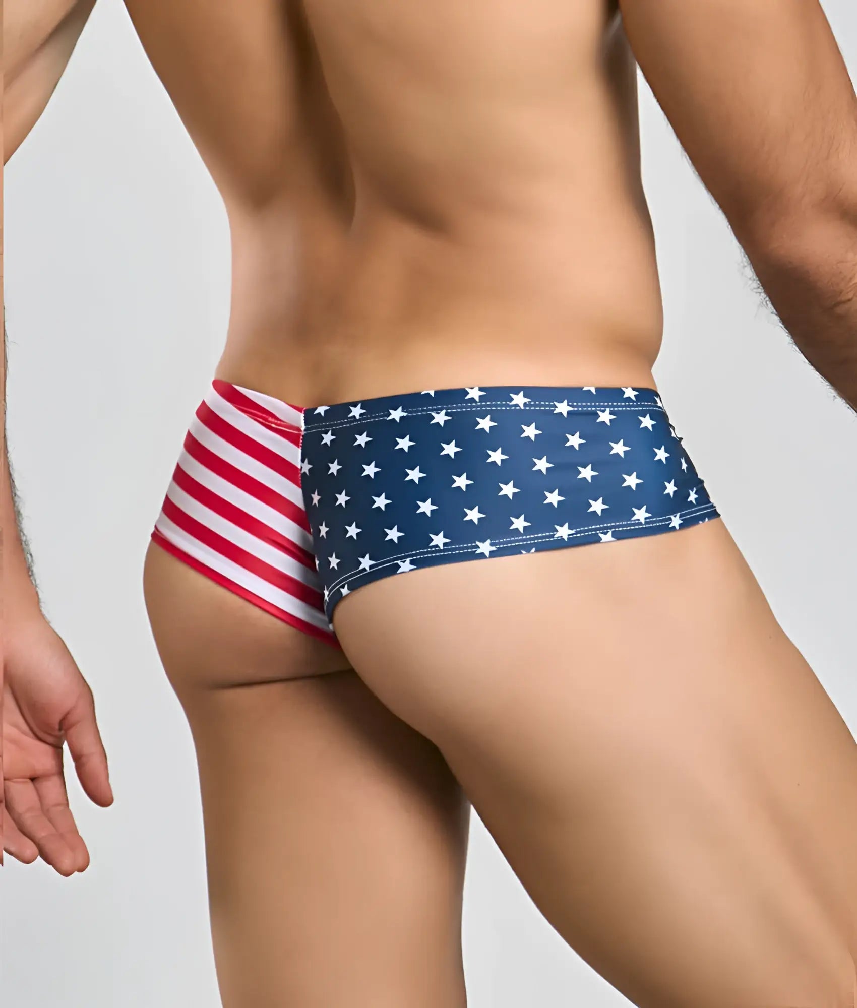 Justin + Simon cheek swim trunks with american flag print featuring blue stars and red white stripes design