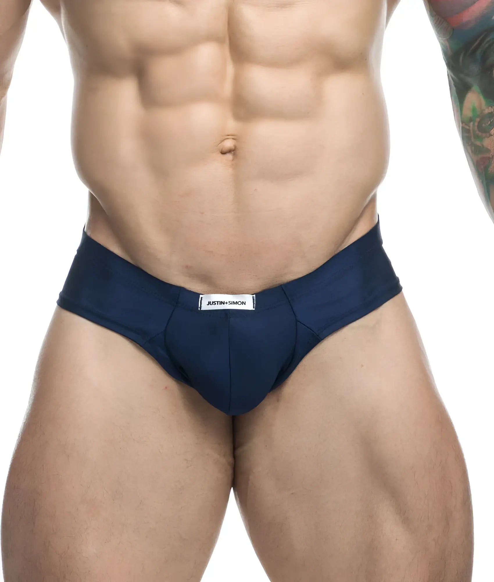 Navy blue justin simon cheek briefs with white label at waistband designed for comfortable everyday wear